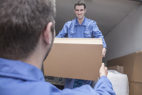 Removal company team maintaining a safe, tidy workspace during a move