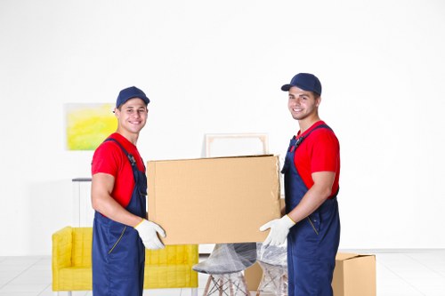 Removal company staff reviewing a customer complaint form