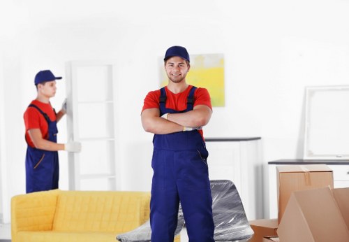 Removal team handling boxes during a Brixton home move