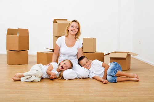 Careful loading of boxes and student furniture for a Brixton move