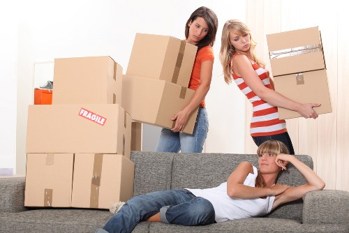 Professional movers preparing boxes for a Brixton relocation